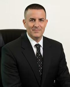 Attorney Gregory H. Comings